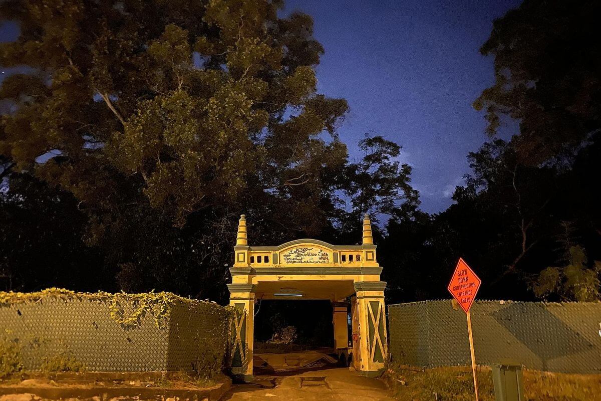 Yellow gates of Kubur Kassim cemetery