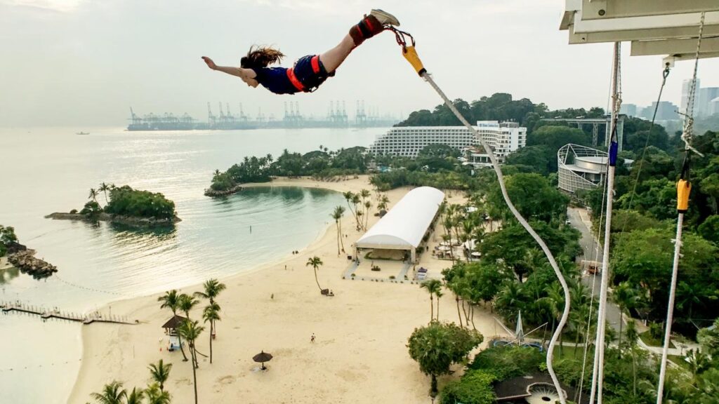 Lady trying bungy jumping at AJ Hackett Sentosa